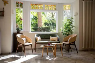 Petit salon de l'entrée de la résidence Les Jardins de Longchamp