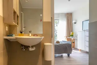 Chambre & Salle de bain de la résidence Pitthem